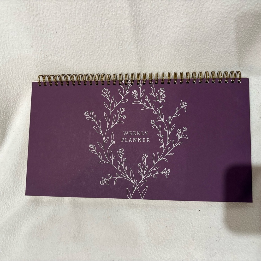 Purple Weekly Planner with Gold Spiral Binding